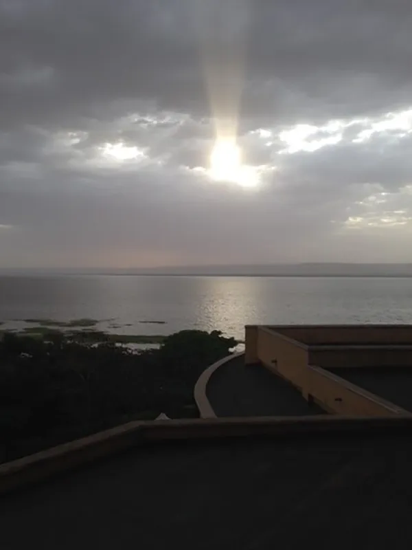 Ethiopia-sunbeam-thru-clounds-over-water-rotated copy